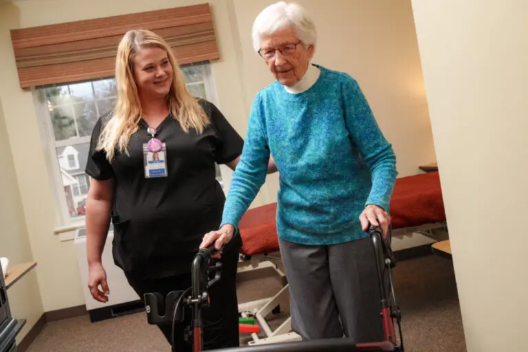 A nurse assisting a long-term care resident at UZRC in Lititz, PA