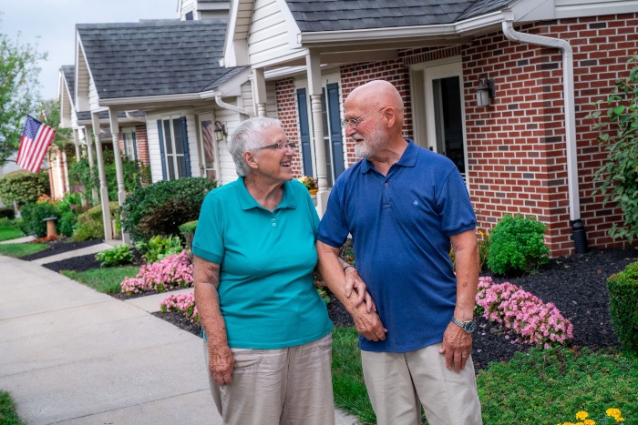 A retired couple walking outside at United Zion Retirement Community in Lititz, PA