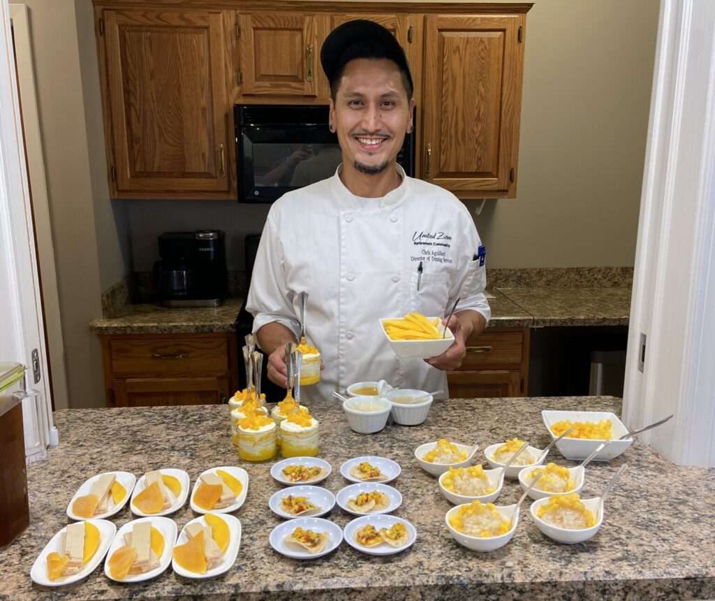 A chef preparing dessert at United Zion Retirement Community