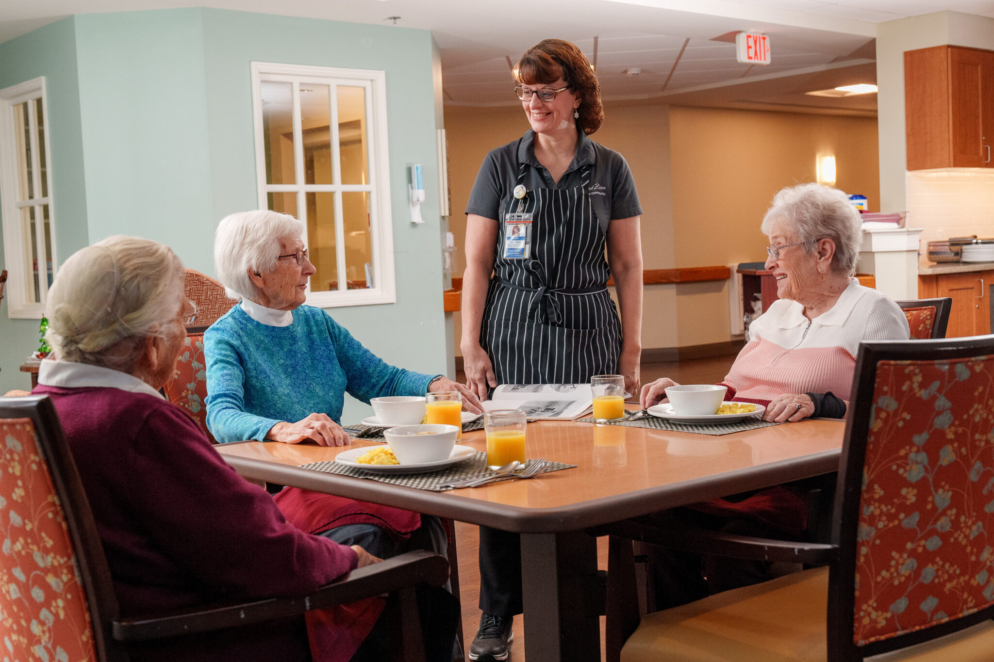 Residents from United Zion Retirement Community being tended to by a member of the staff